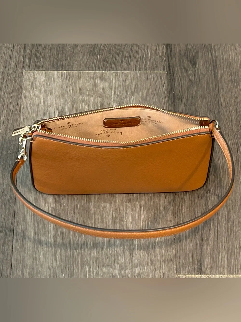 KATE SPADE Pebbled Leather Wristlet/Clutch Bag with Gold Hardware.
